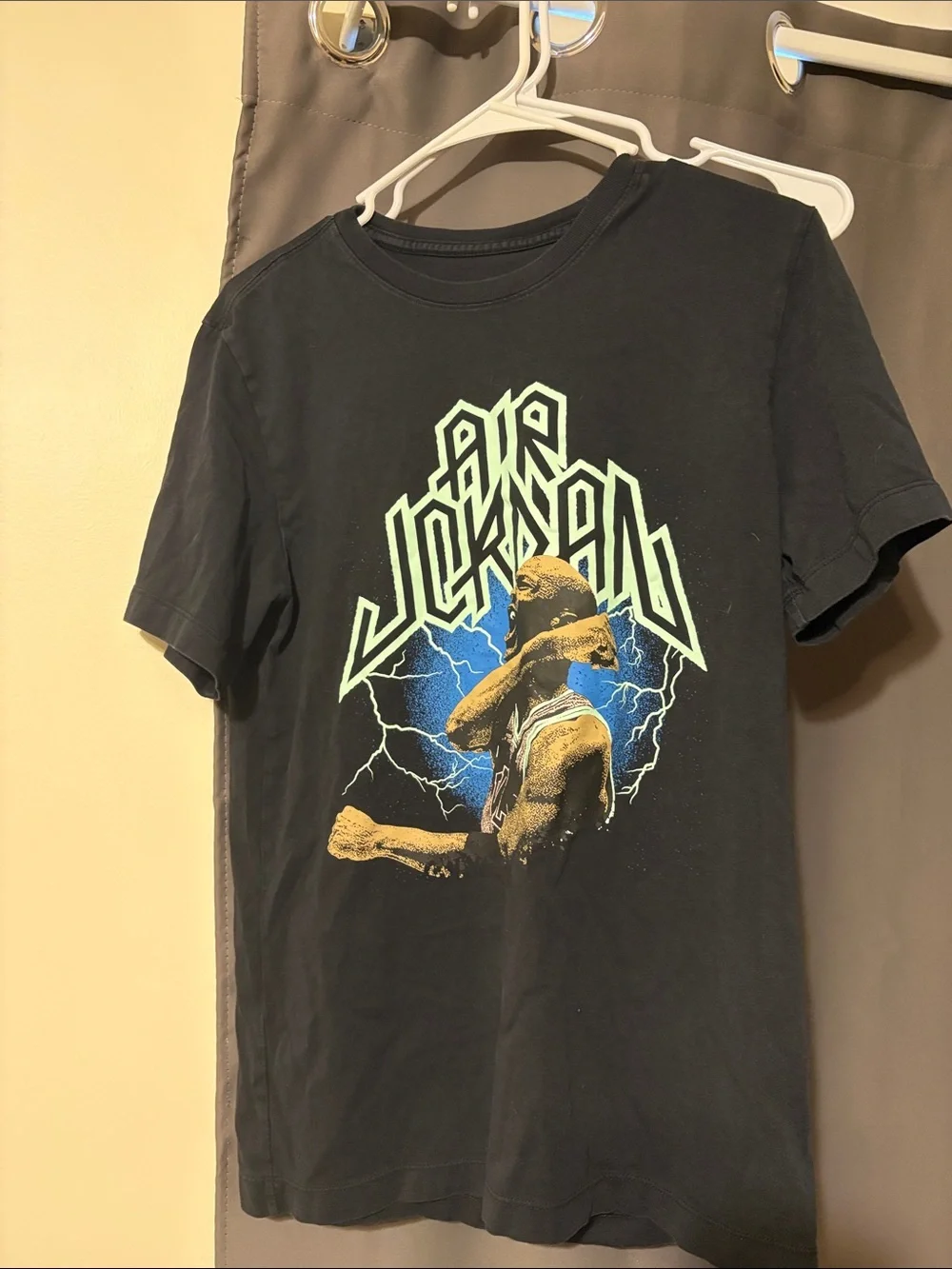 Jordan Black Graphic Tee with Neon Green Logo and Blue Lightning